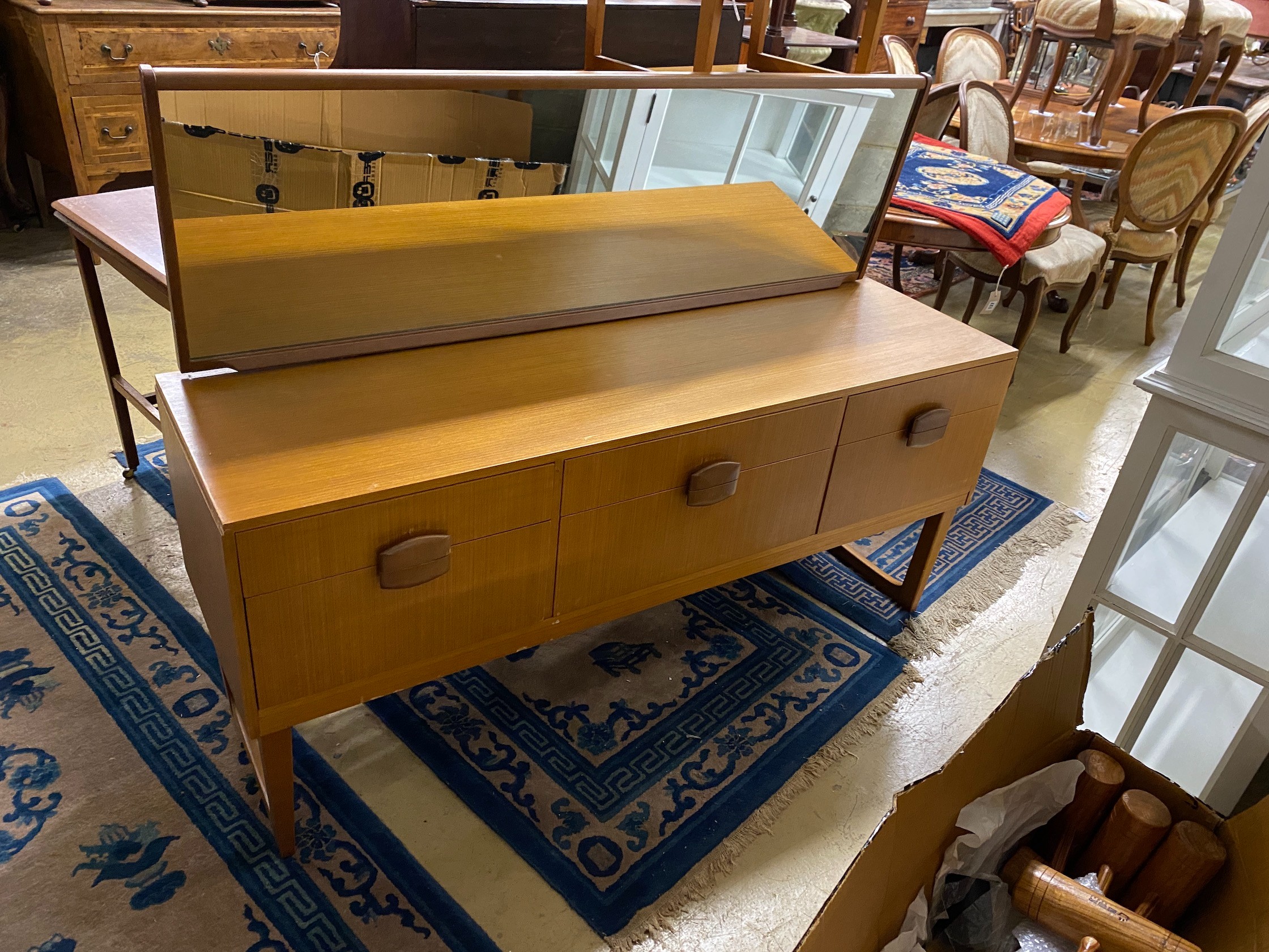 A mid century teak dressing table, width 147cm, depth 43cm, height 112cm, together with a stool, chest and folding card table